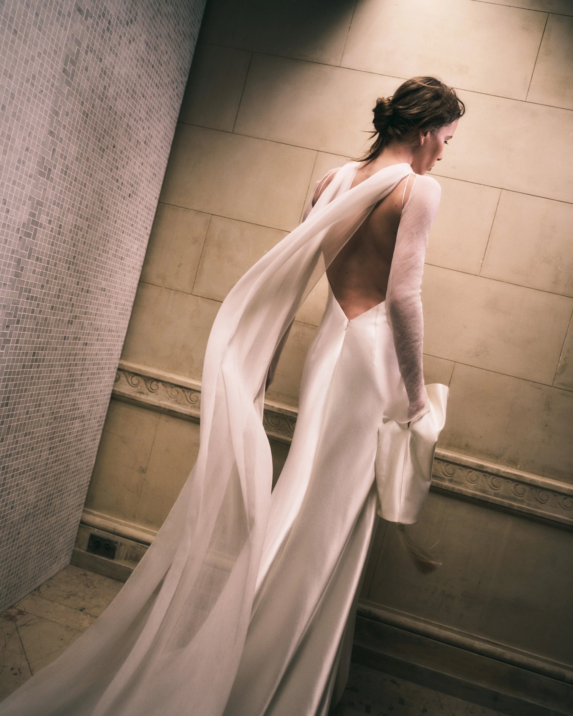 crinkle chiffon wedding dress Soft, effortless, and dreamy This wedding dress is lighter than air and is so beautiful! Ivory crinkle chiffon gives the gown a unique look while supporting a super flattering shape!