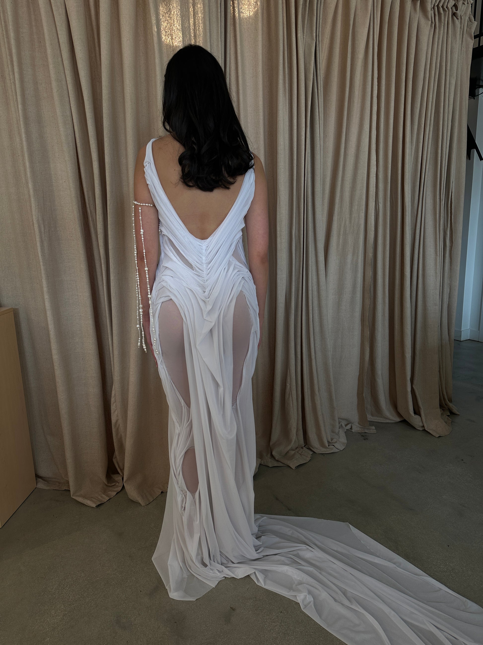 wet look dress designer Iconic Wetlook dress Print motive is based on a photo series, using prints reminiscent of wet clothes, fabric enveloping the wearer reality and illusion. In contrast to the expressive texture, the silhouette